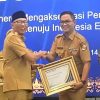 Bupati Lampung Utara Terima Penghargaan Sebagai Pioner Kemandirian Ekonomi Desa